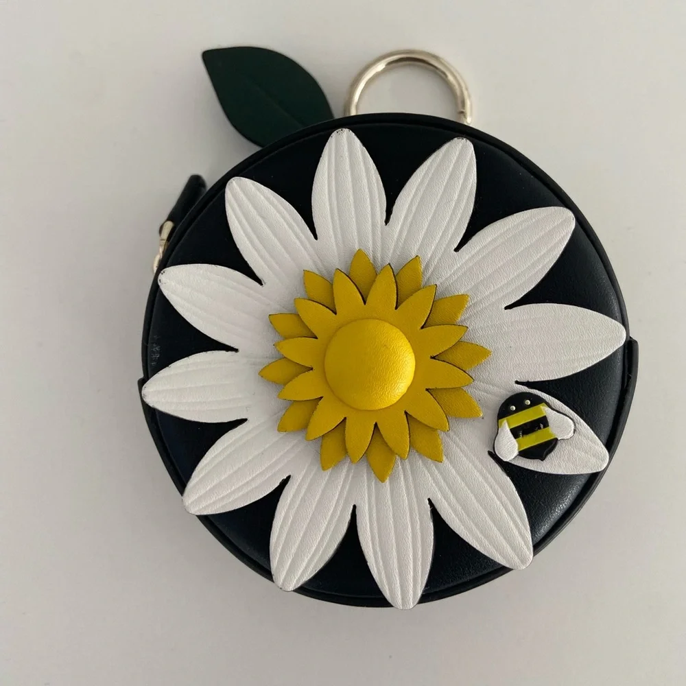 Kate spade daisy coin purse.